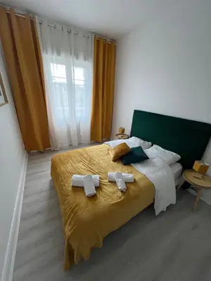 Un ou plusieurs lits dans un hébergement de l'établissement Esprit Forêt N0ire - appartement de luxe 3 chambres