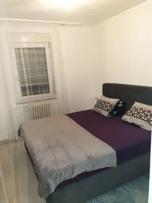 Un ou plusieurs lits dans un hébergement de l'établissement LOVE Appartement partagé avec le proprietaire