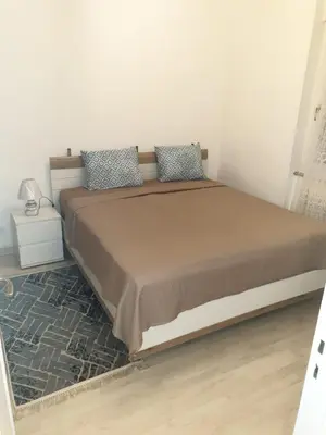 Un ou plusieurs lits dans un hébergement de l'établissement LOVE Appartement partagé avec le proprietaire