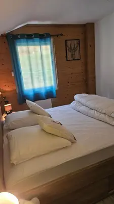 Un ou plusieurs lits dans un hébergement de l'établissement La Ferme du Badon
