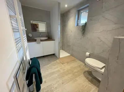 Salle de bains dans l'établissement La Grange proche d’Europapark