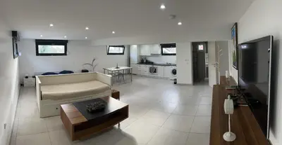 Télévision ou salle de divertissement dans l'établissement Elvan’s home