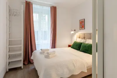 Un ou plusieurs lits dans un hébergement de l'établissement Travel Homes - Niffel 1 - Un havre de paix près du Parc
