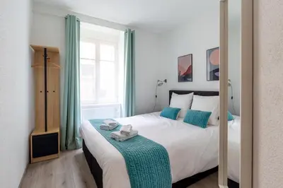 Un ou plusieurs lits dans un hébergement de l'établissement Travel Homes - Niffel 2 - Un havre de paix près du Parc