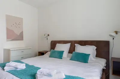 Un ou plusieurs lits dans un hébergement de l'établissement Travel Homes - Niffel 2 - Un havre de paix près du Parc