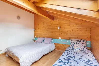 Un ou plusieurs lits dans un hébergement de l'établissement Kioné - duplex avec terrasse