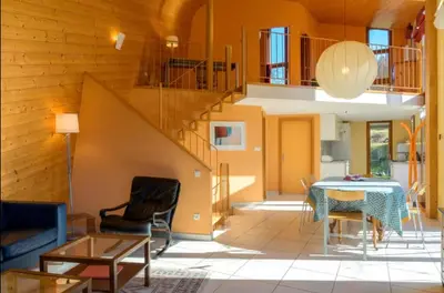Coin salon dans l'établissement Gîte du Kiwi