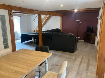 Coin salon dans l'établissement Gite les Remparts de Turckheim