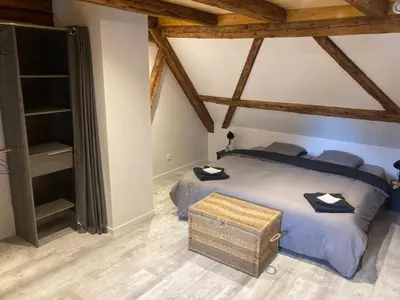 Un ou plusieurs lits dans un hébergement de l'établissement Gite les Remparts de Turckheim