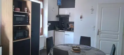 Cuisine ou kitchenette dans l'établissement CHEZ JOSY