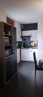 Cuisine ou kitchenette dans l'établissement CHEZ JOSY