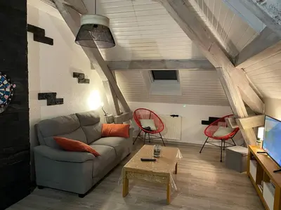 Coin salon dans l'établissement Loft avec jardin