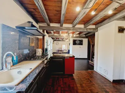 Cuisine ou kitchenette dans l'établissement Gitedaval Le Petit Hangy