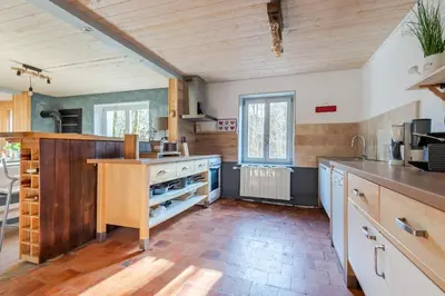 Cuisine ou kitchenette dans l'établissement La Bergerie Des Amis