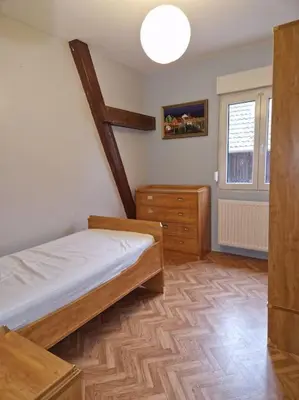 Un ou plusieurs lits dans un hébergement de l'établissement Appartement Le Grillenbreit