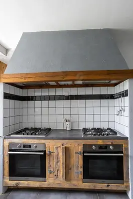 Cuisine ou kitchenette dans l'établissement Gîte 4 à 10 pers