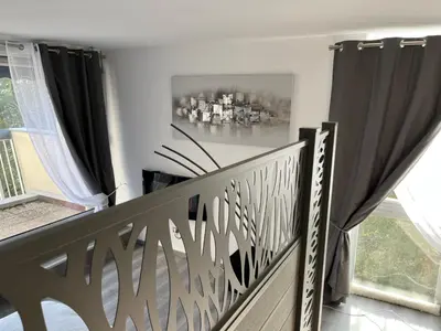 Balcon ou terrasse dans l'établissement l'Ecrin du Bonheur