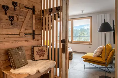 Coin salon dans l'établissement Terre de Sapins