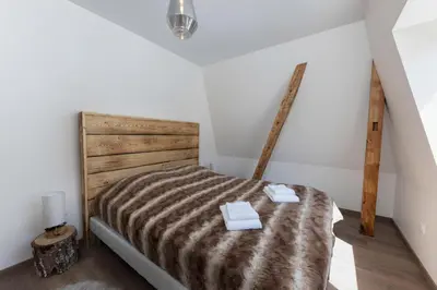 Un ou plusieurs lits dans un hébergement de l'établissement COTE MONTAGNE