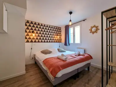 Un ou plusieurs lits dans un hébergement de l'établissement Travel Homes - NewGate 2, elegant, heart of Colmar