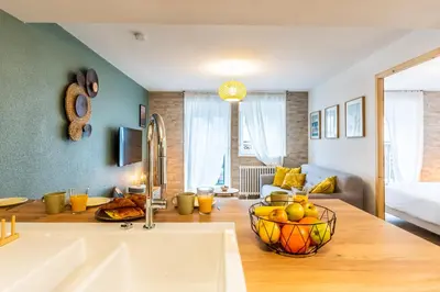 Coin salon dans l'établissement Le 05-GregIMMO-Appart'Hôtel