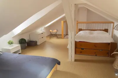 Un ou plusieurs lits dans un hébergement de l'établissement City center duplex loft