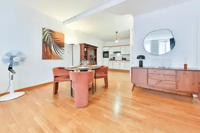 Cuisine ou kitchenette dans l'établissement ColmarAppart Vauban avec Spa