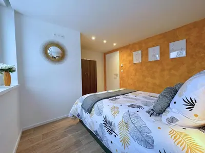 Un ou plusieurs lits dans un hébergement de l'établissement La forêt Enchantée - Cozy Immo