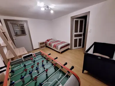 Salle de jeux dans l'établissement GITE DES 3 JONQUILLES