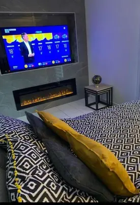 Télévision ou salle de divertissement dans l'établissement Appartement Premium Le Marquis