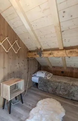 Un ou plusieurs lits dans un hébergement de l'établissement Charmant chalet cosy & paisible en pleine nature - refuge idyllique pour 5p