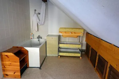 Un ou plusieurs lits dans un hébergement de l'établissement Appartement dans vielle ferme au coeur des Vosges