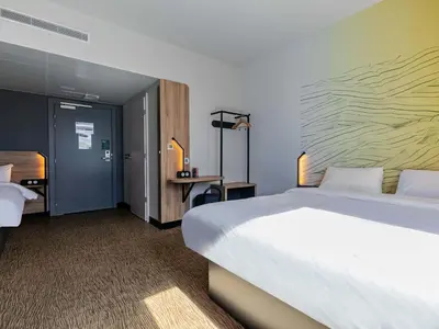 Un ou plusieurs lits dans un hébergement de l'établissement B&B HOTEL Sélestat Centre-Alsace
