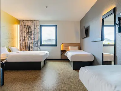 Un ou plusieurs lits dans un hébergement de l'établissement B&B HOTEL Sélestat Centre-Alsace