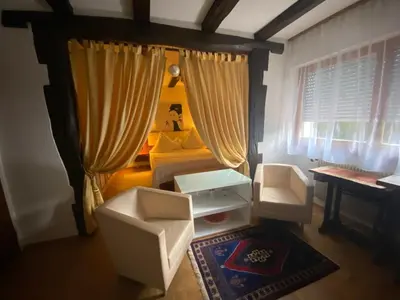 Un ou plusieurs lits dans un hébergement de l'établissement RIVER side appartment