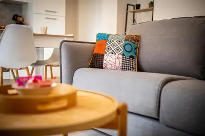 Coin salon dans l'établissement Le 54-GregIMMO-Appart'Hôtel
