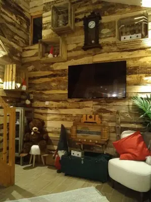 Télévision ou salle de divertissement dans l'établissement Maisonnette