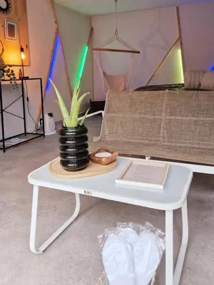 Coin salon dans l'établissement La Maison des Petits Bonheurs