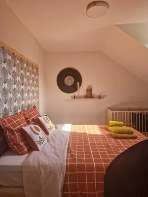 Un ou plusieurs lits dans un hébergement de l'établissement La Maison des Petits Bonheurs