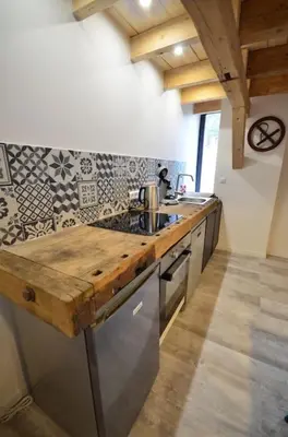 Cuisine ou kitchenette dans l'établissement L’Etable