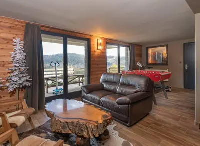 Coin salon dans l'établissement Luxueux chalet avec vue sur les pistes et le Hohneck
