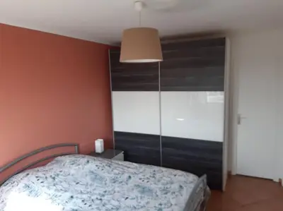 Un ou plusieurs lits dans un hébergement de l'établissement Logement idéal pour un séjour alsacien en amoureux