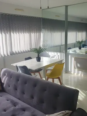 Coin salon dans l'établissement Jolie appartement