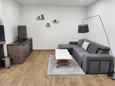 Coin salon dans l'établissement Joli Studio cosy