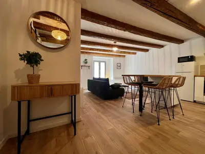 Coin salon dans l'établissement Les Poutres de Cuvier